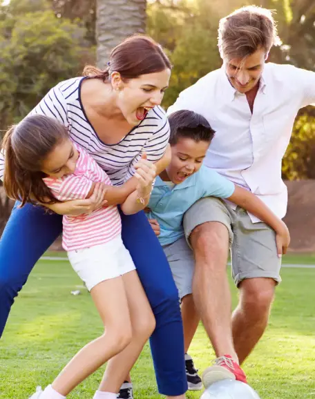 Family playing together outdoors